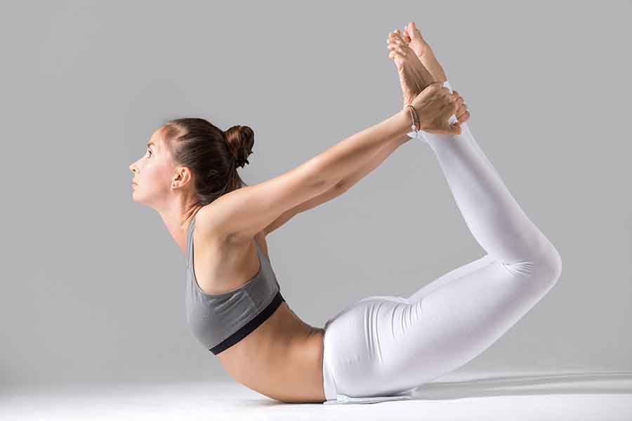 Yoga, posture de l'arc.